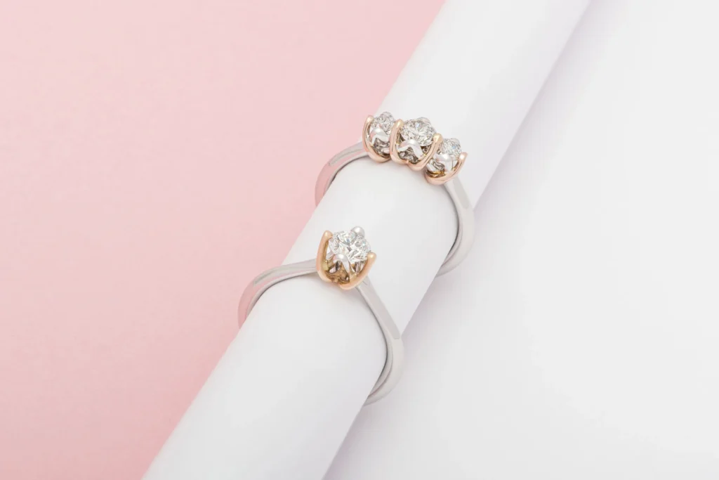 Gold solitaire and trilogy rings set with diamonds
