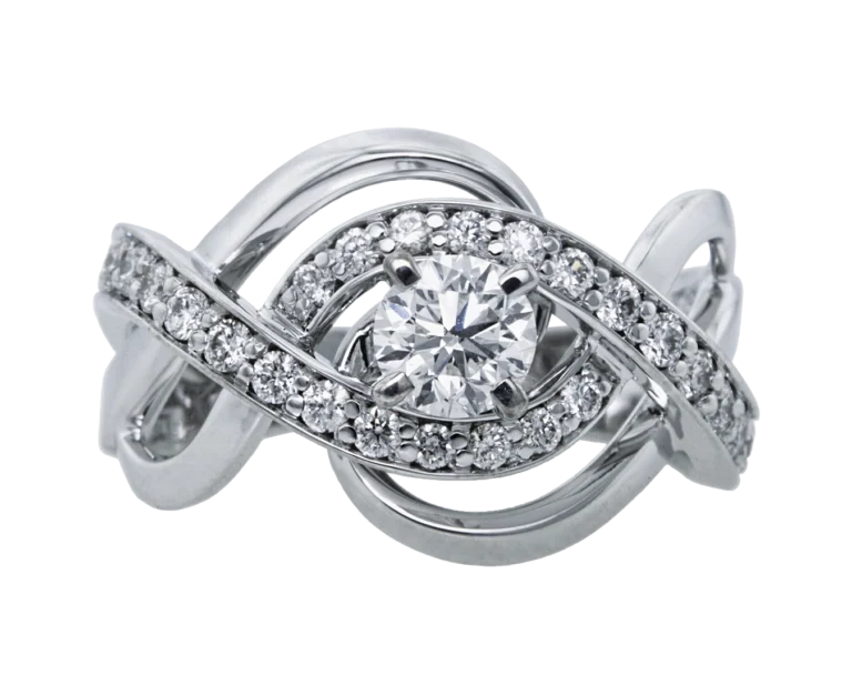 ‘Love Braid’ ring with a diamond and pavé setting on an intertwined band