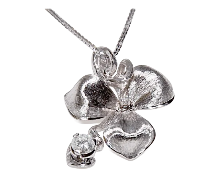 White gold orchid pendant with diamonds, front view of the petals