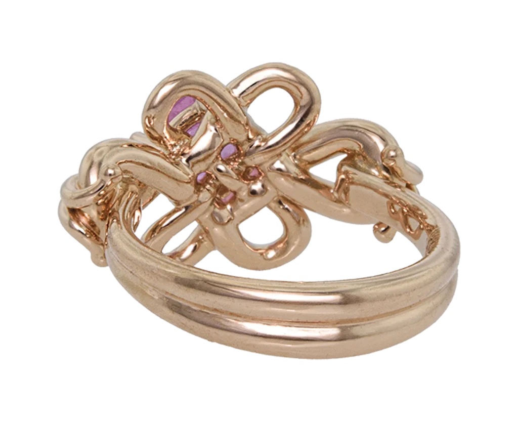 Anello in oro rosa con design a fiocco e zaffiri rosa, vista posteriore