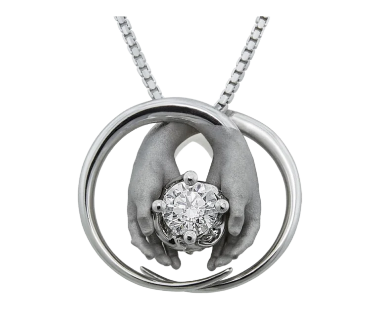 White gold and diamond pendant A gift for you, with two hands cradling the central stone