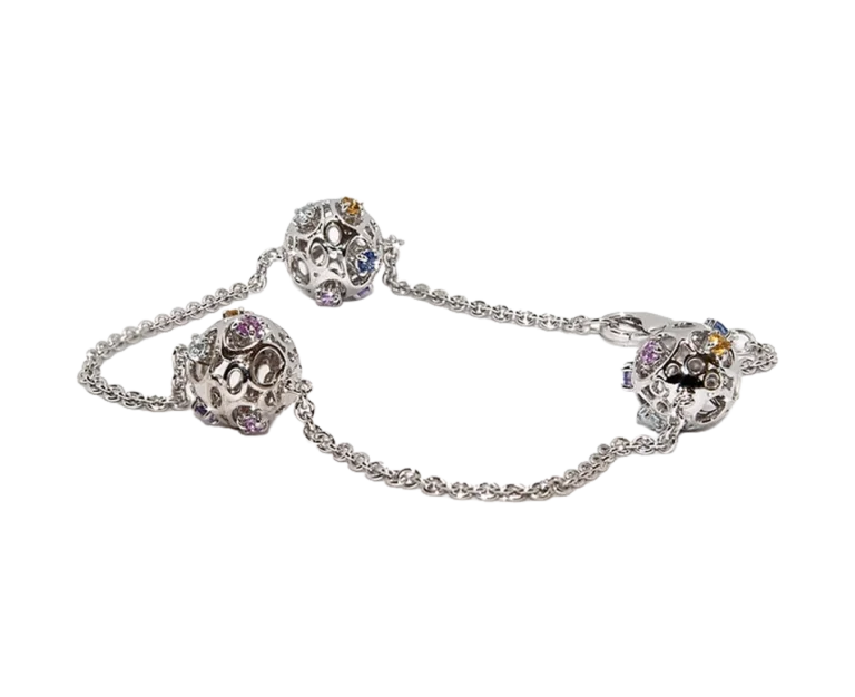 Detail of the Coloured Bubbles bracelet with three spherical elements and coloured natural stones