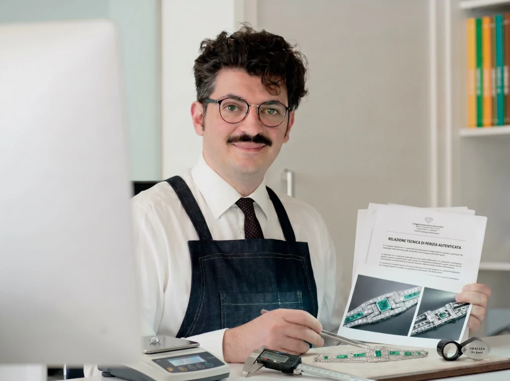 Antonio Colonna shows technical documentation, certifications and expert reports during a professional consultation