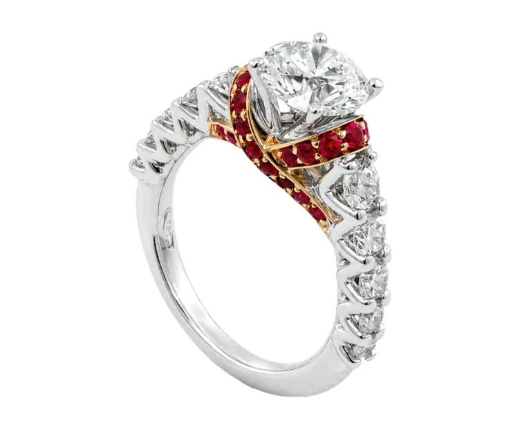 White and rose gold engagement ring with red rubies and white diamonds, red ribbon, front view