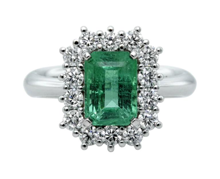 White gold ring with an octahedral emerald and natural diamonds viewed from the front