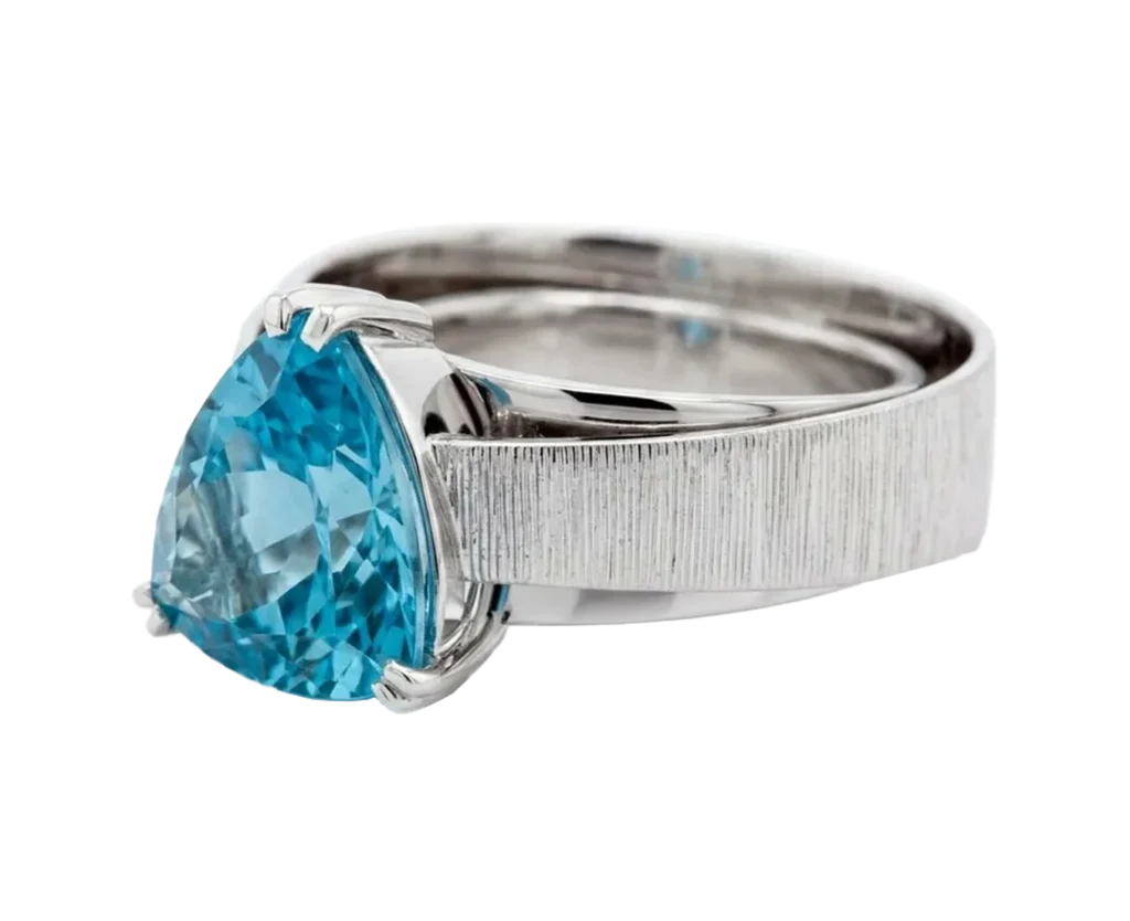 White gold ring with trillion-cut aquamarine viewed from the side