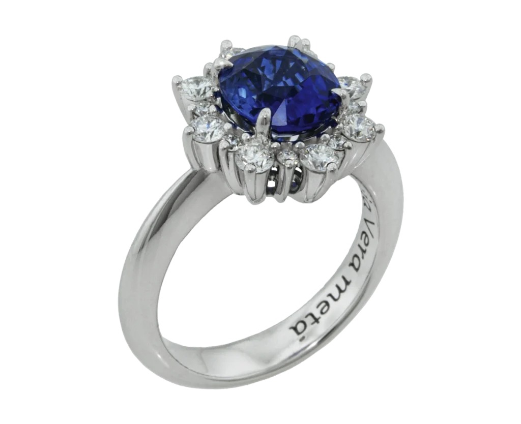 White gold snowflake ring with blue sapphire and diamonds, side view