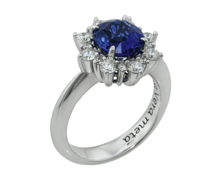 White gold snowflake ring with blue sapphire and diamonds, side view