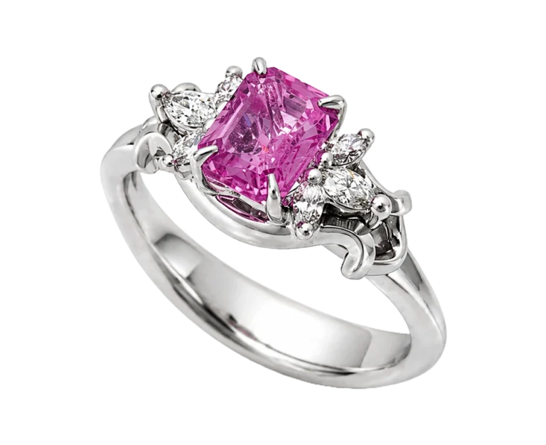Three-quarter view of the Revelation ring in the sea with pink sapphire and diamonds