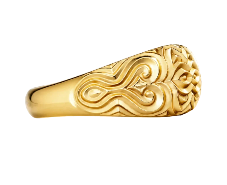 Yellow gold ring with a mandala motif seen from the side