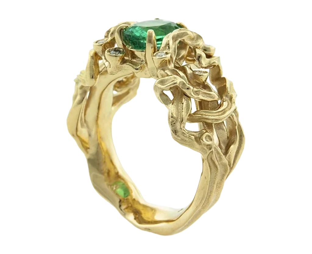 Side view of the Radici ring with a natural emerald