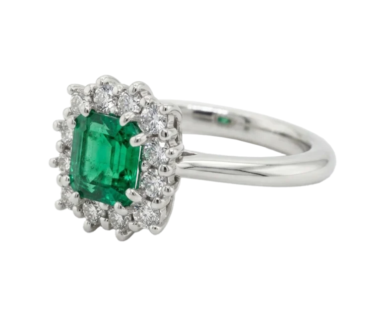 Side view of the Wisdom ring with emerald and diamonds