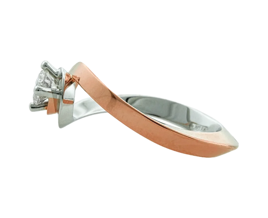 Side view of the Spiral white and rose gold ring with diamond