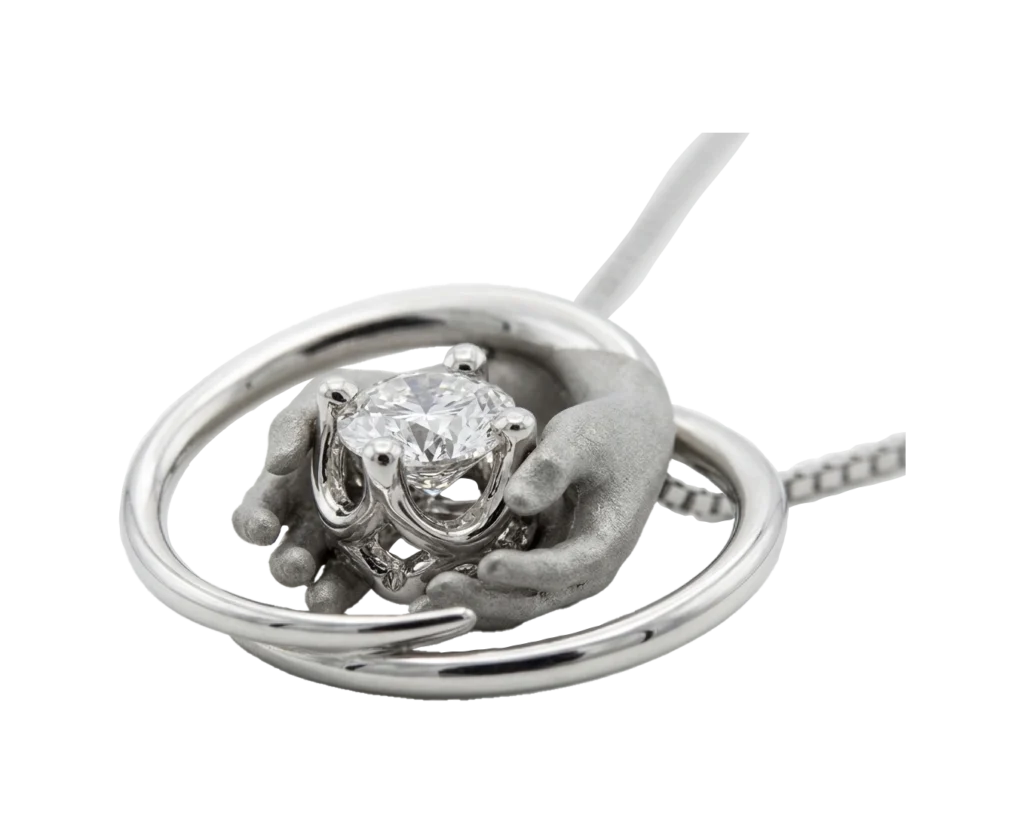 Side view of the A gift for you pendant with natural diamond and modelled hands